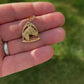 A Horse and Stirrup Gold Charm